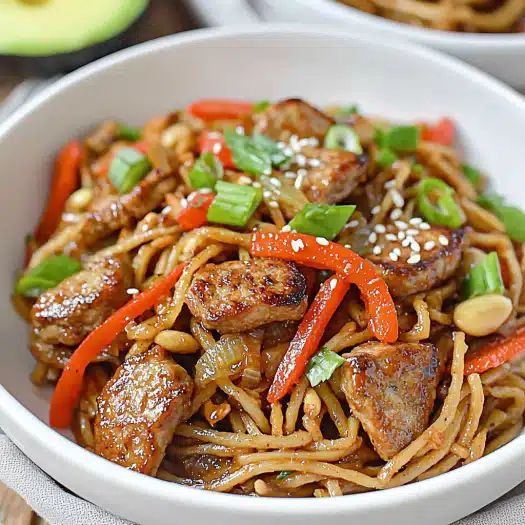 Spicy Peanut Noodles with Seared Sausage
