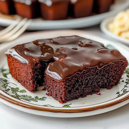  Moist Chocolate Cake Squares with Glossy Fudge Frosting