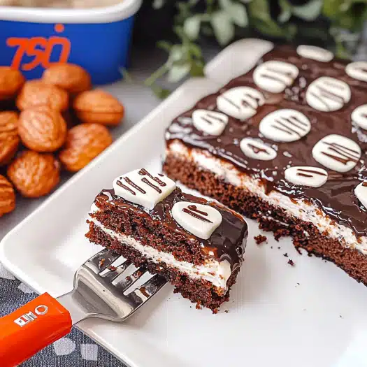 Layered Chocolate Almond Cake with Cream Filling